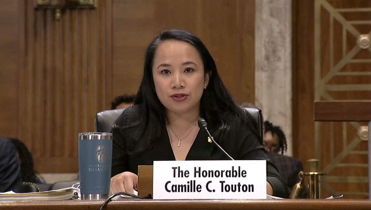 Commissioner Touton testifying before the U.S. Senate